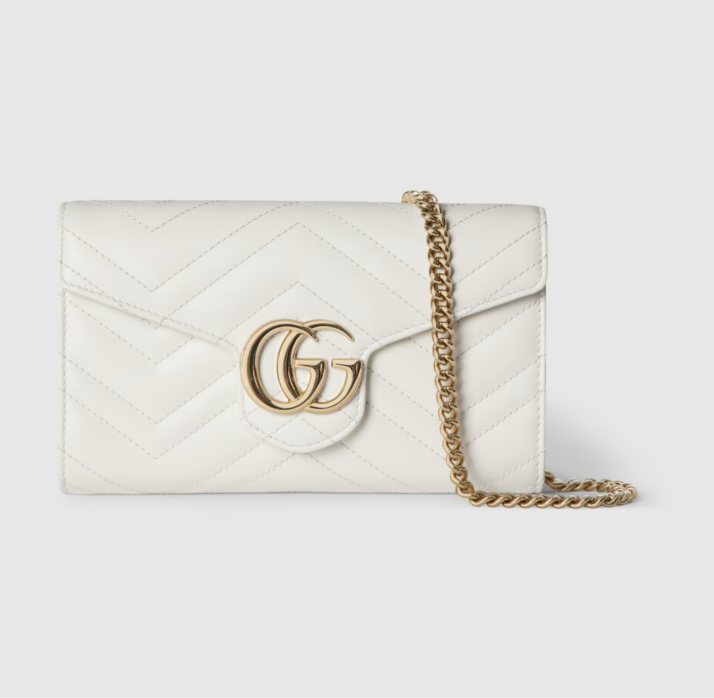 GG MARMONT WALLET IS HANGING IN A SERIES