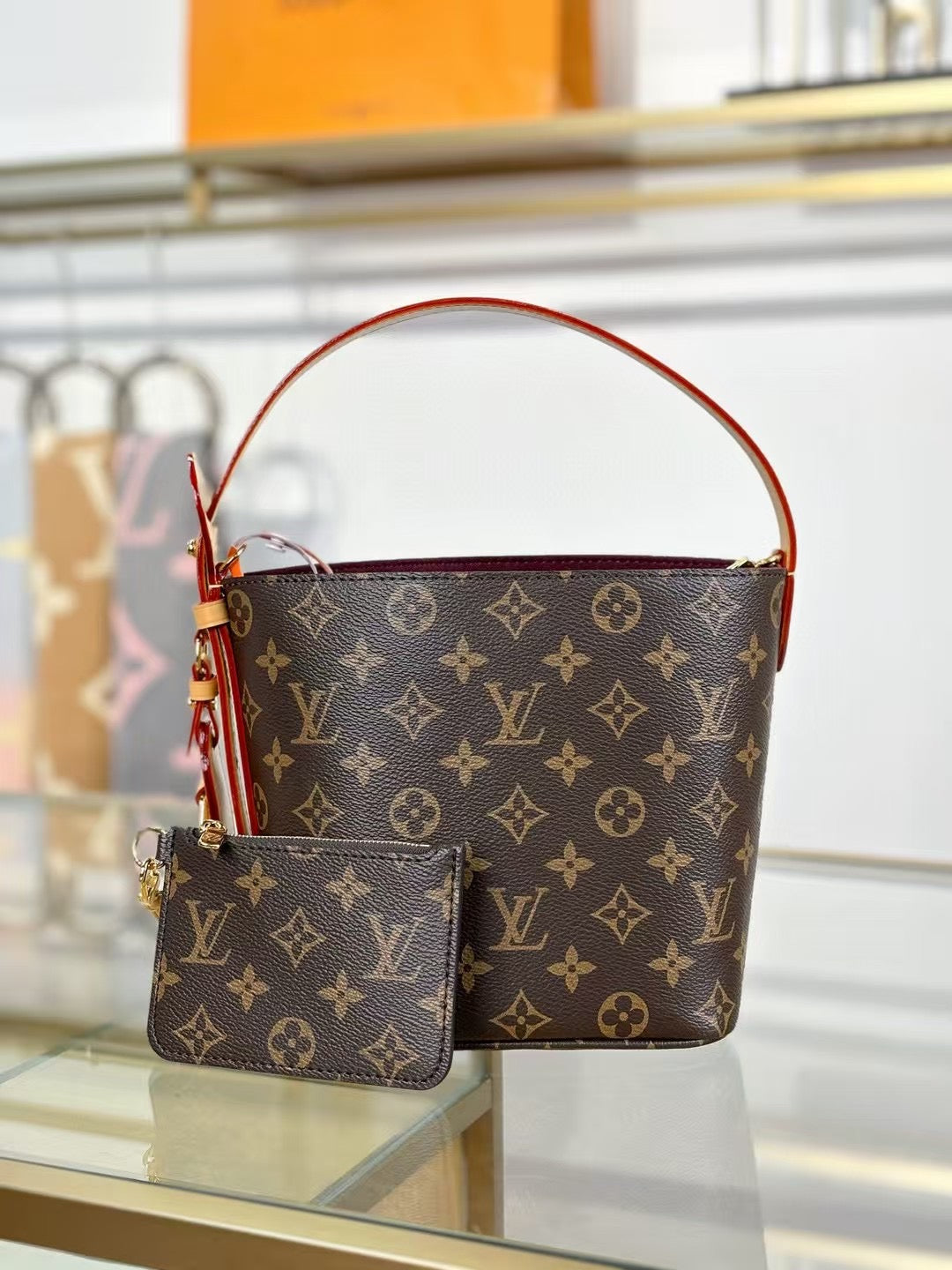 OnTheGo PM Monogram Canvas Brown Red Tote Bag