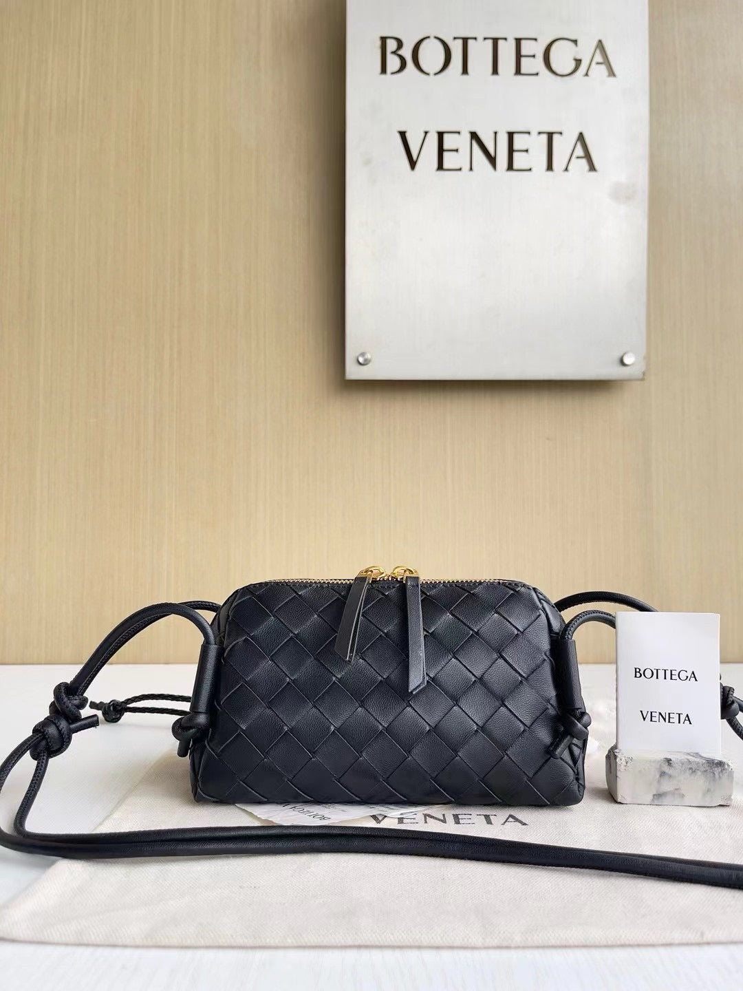 Compact Woven Crossbody Bag with Side Knots