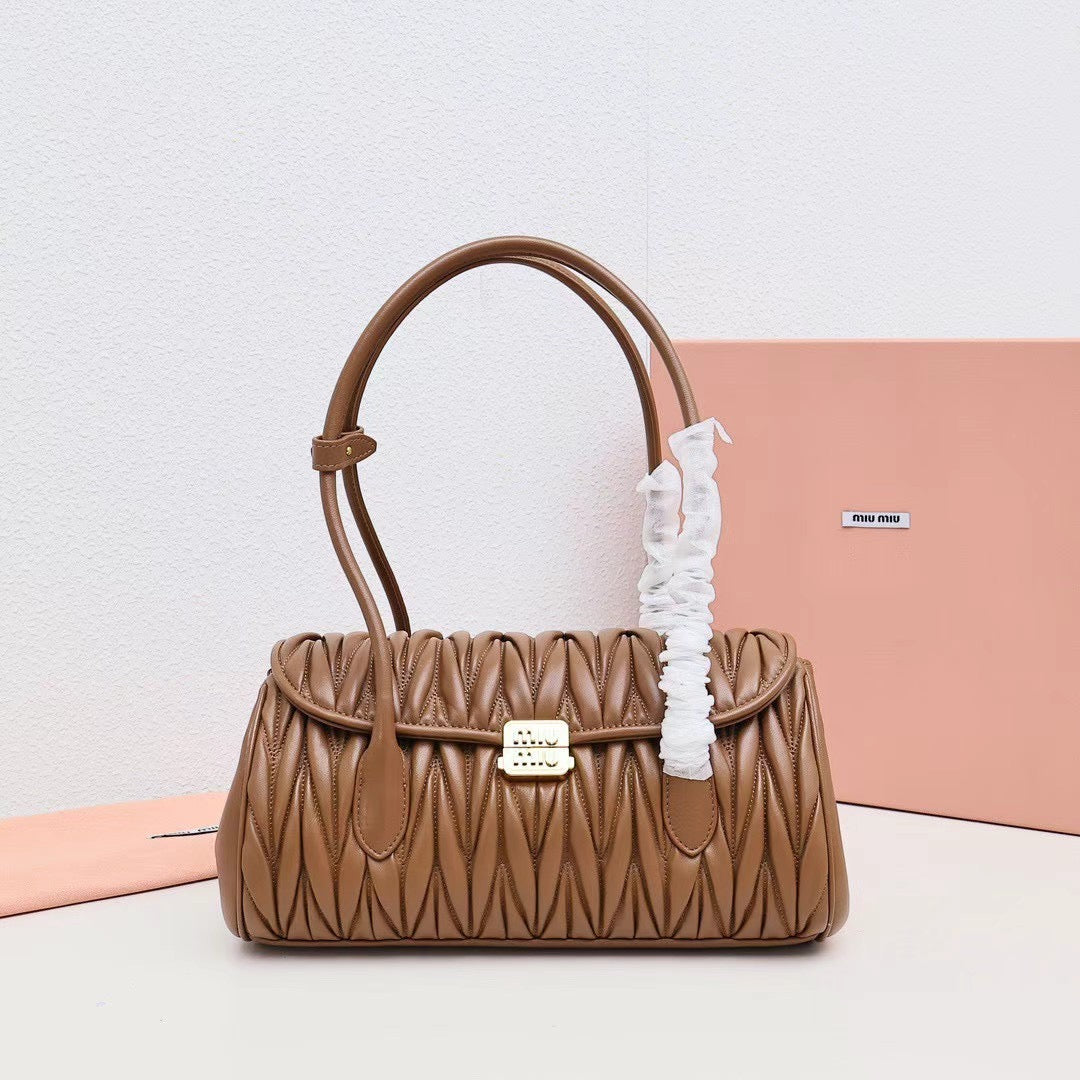 Elegant Quilted Barrel Shoulder Bag