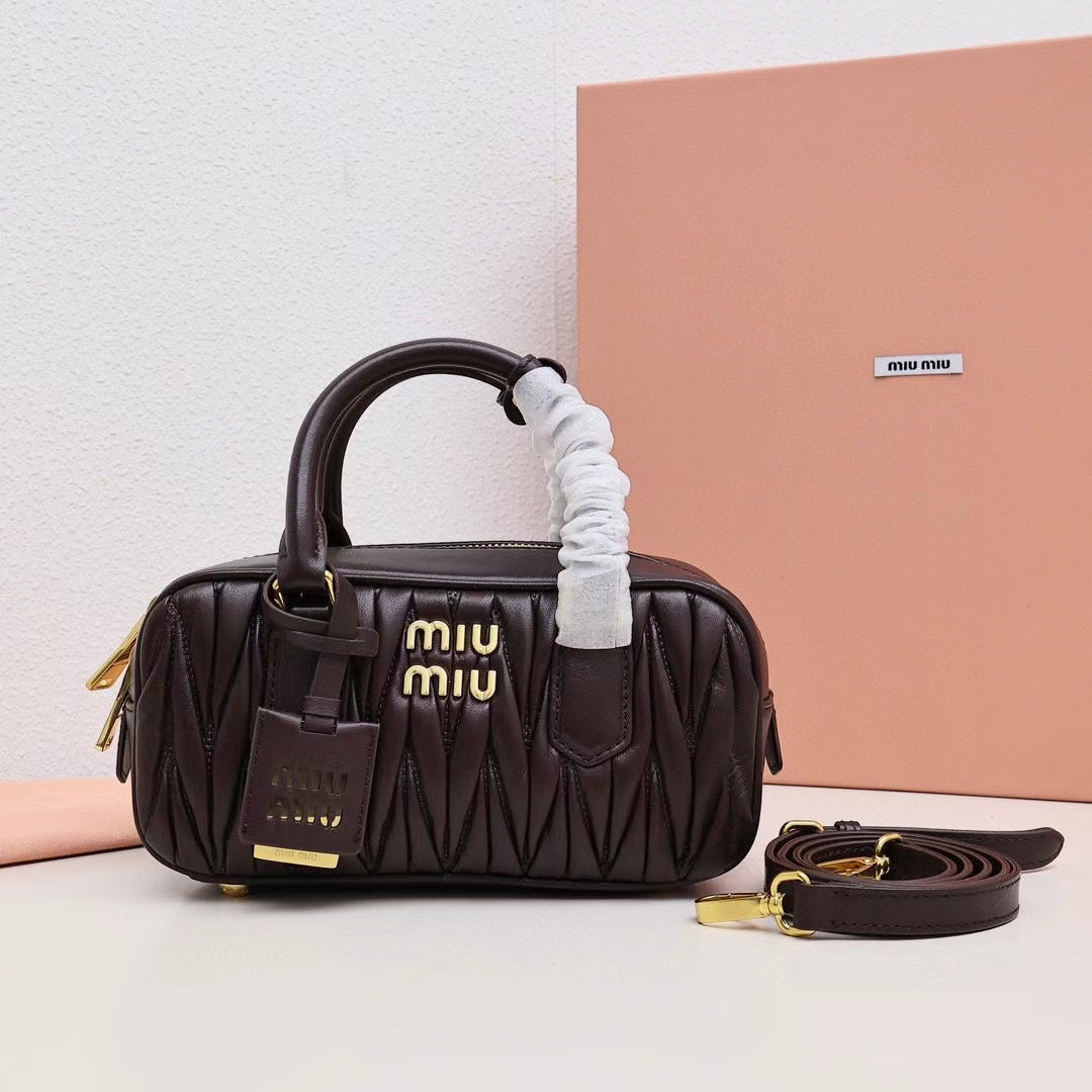 Quilted Leather Handbag with Logo Tag