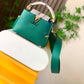 Capucines Mini Taurillon Leather Python Trim Top Handle Bag