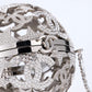 Chanel 25A silver star-patterned spherical evening bag 01
