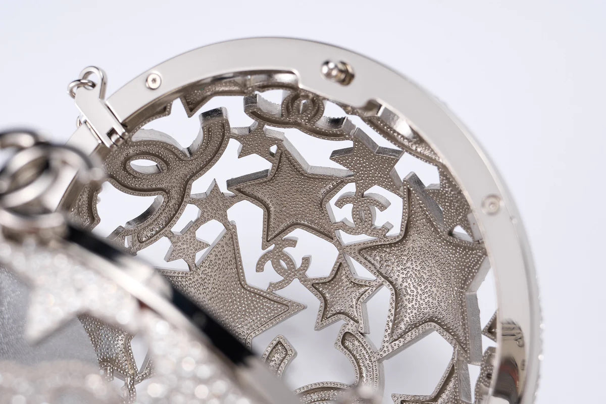 Chanel 25A silver star-patterned spherical evening bag 01