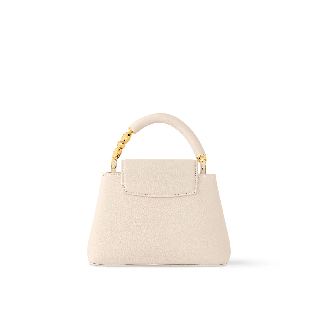Capucines Mini Taurillon Leather Pink Sky Top Handle Bag